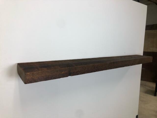 60" Reclaimed Barn Wood Fireplace Mantel Shelf - 3x8 on white wall  left angle view