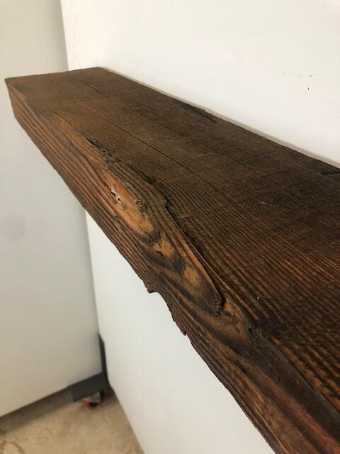 60" Reclaimed Barn Wood Fireplace Mantel Shelf - 3x7 on white wall close up
