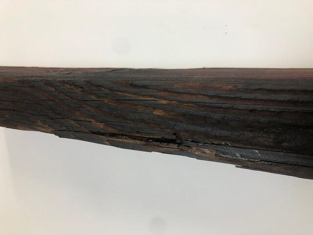 60" Reclaimed Barn Wood Fireplace Mantel Shelf - 3x7 front on white wall close up front view
