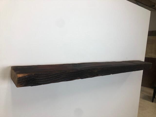 60" Reclaimed Barn Wood Fireplace Mantel Shelf - 3x7 front on white wall left angle view
