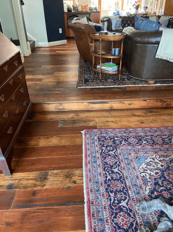 Douglas Fir reclaimed wood in living room with leather furniture and rug