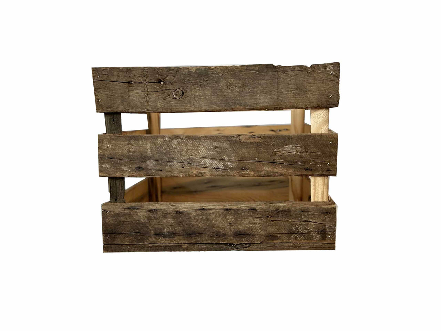 reclaimed wood crate with spaces in between the slats. There are three slats with an equal space in between. Wood displays distressed characteristics.