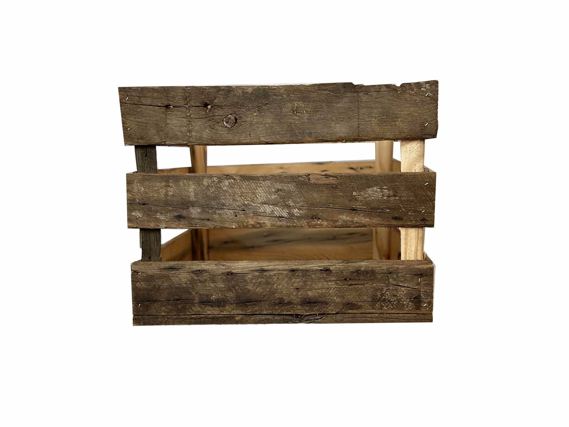 reclaimed wood crate with spaces in between the slats. There are three slats with an equal space in between. Wood displays distressed characteristics.