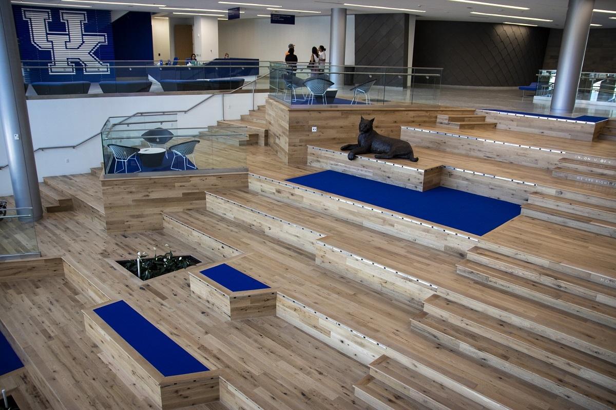 Racehorse Oak Red & White Mix Clean Face wood flooring used in a modern university common area with large cat sculpture