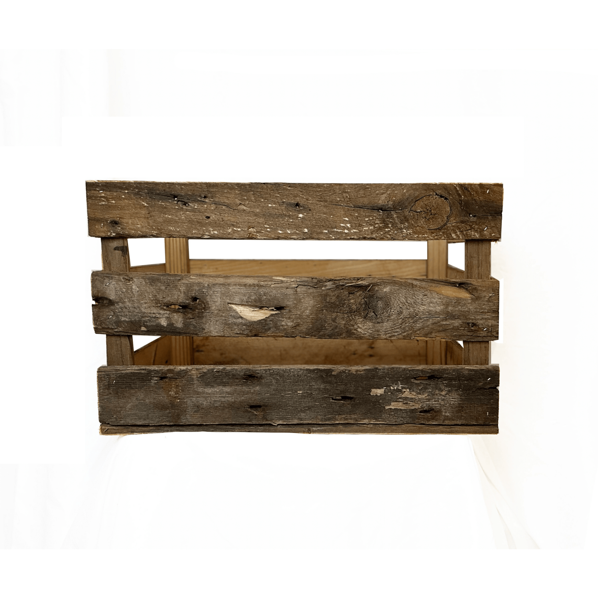reclaimed wood crate with spaces in between the slats. There are three slats with an equal space in between. Wood displays distressed characteristics.