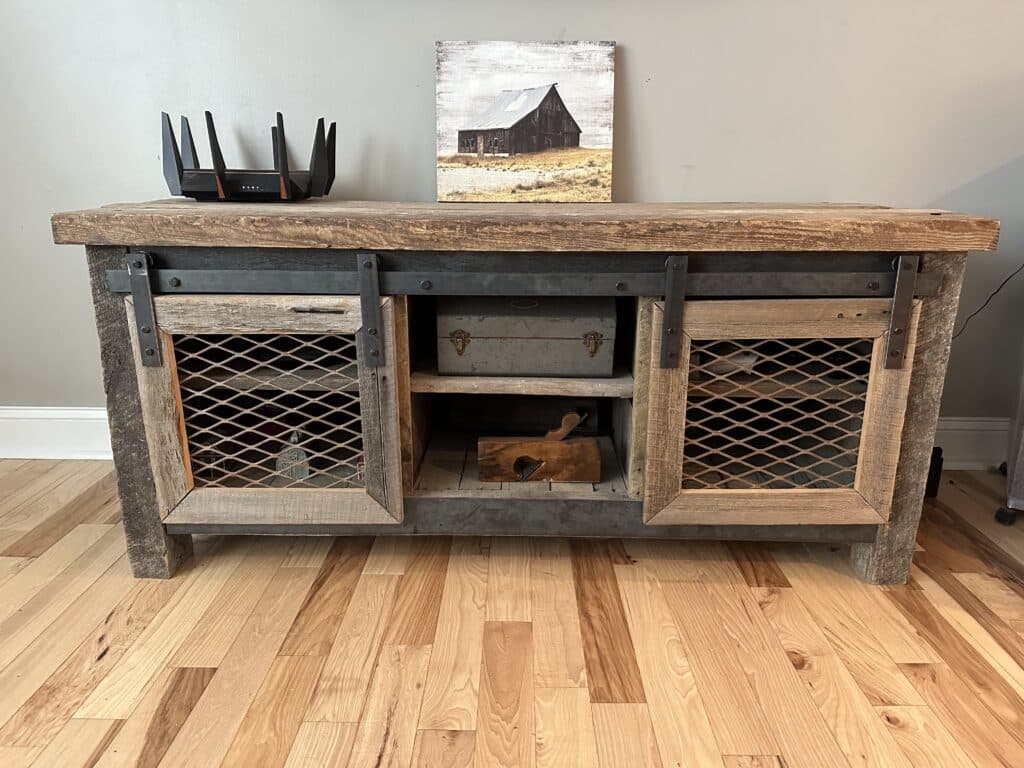 Reclaimed wood flooring with reclaimed barn wood table