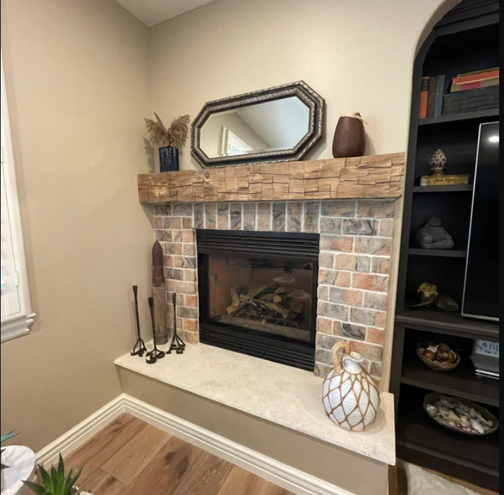 Hand hewn beam over fireplace