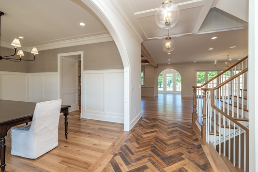 Heartland Barnwood Mixed Hardwoods Clean Face wood flooring in common area of hours with stairs