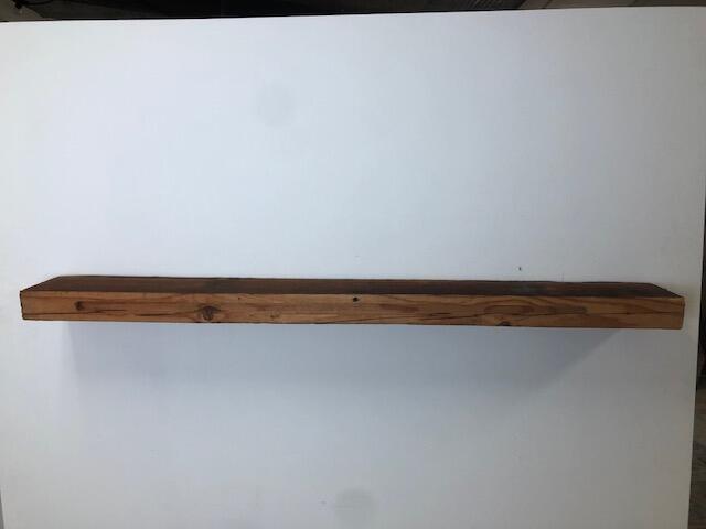 60" Reclaimed Barn Wood Fireplace Mantel Shelf - 3x7 on white wall front view