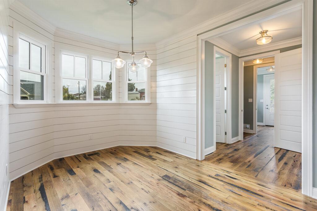 Racehorse Oak Red & White Mix Skip-Planed Black wood flooring in common area