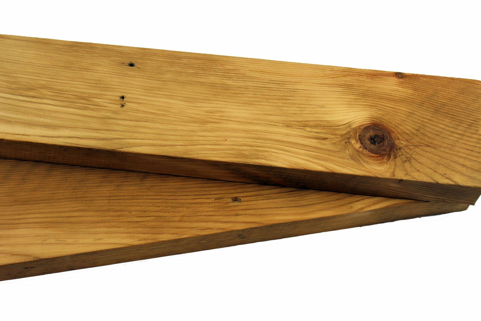 a set of two shelves shown in the unfinished or natural option.
