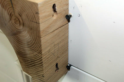 keyhole slots shown on back of corbel at top and bottom for mounting.