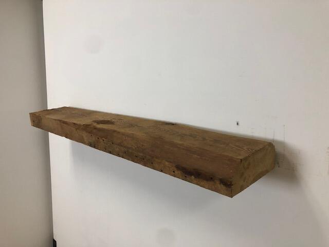 48" Reclaimed Barn Wood Fireplace Mantel Shelf - 3x8 on white wall angle view