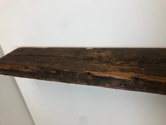 60" Reclaimed Barn Wood Fireplace Mantel Shelf - 3x8 on white wall close up