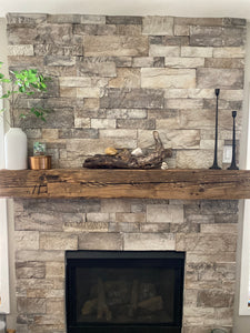 Reclaimed Wood Mantel on brick fireplace