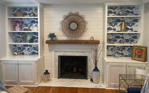 Reclaimed Wood Mantel above fireplace with shelving on either side 