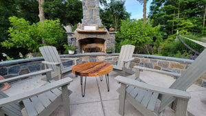 Reclaimed Wood  table outside with fireplace