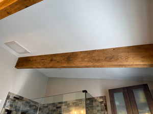 Reclaimed wood beam in ceiling