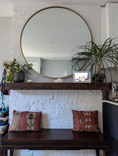 Reclaimed Wood Floating Fireplace Mantel with decor and mirror