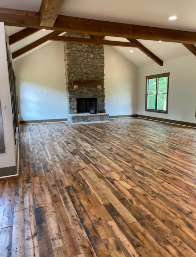 Reclaimed Industrial Oak Engineered Flooring in living room with fireplace
