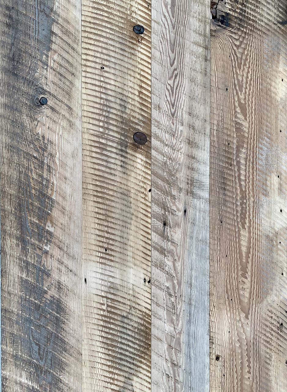 barnwood paneling at a wider angle showing color variations and characteristics.