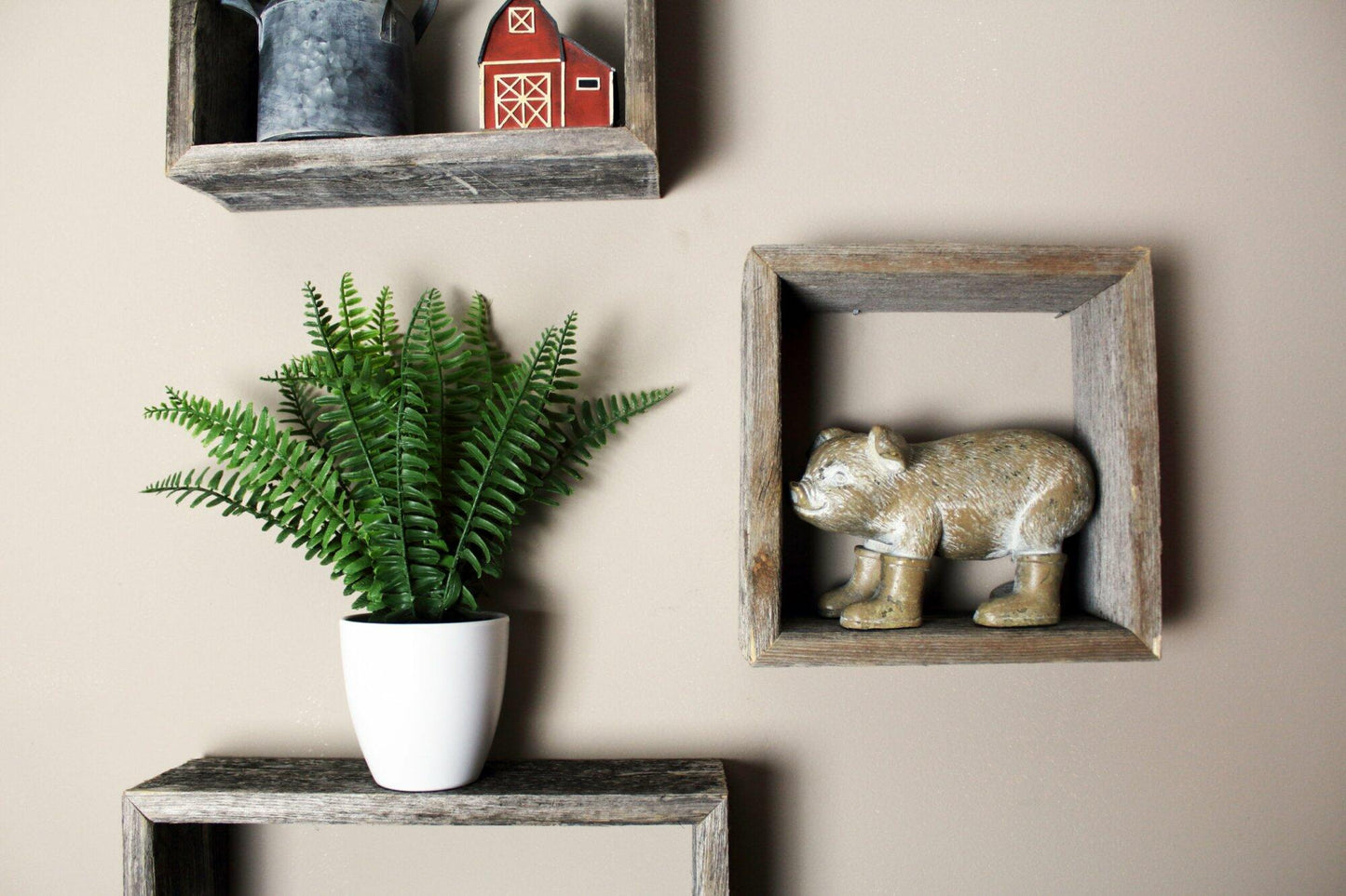 wood characteristics close up on decorated, open box shelves.