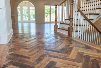 Close up of Heartland Barnwood Oak Red & White Mixed Skip-Planed Brown wood flooring  in stair well