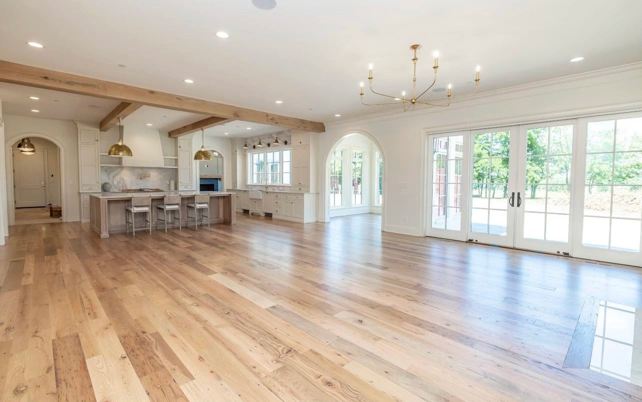 Heartland Barnwood Oak Red & White Mixed Clean Face wood flooring in living room looking towards open kitchen