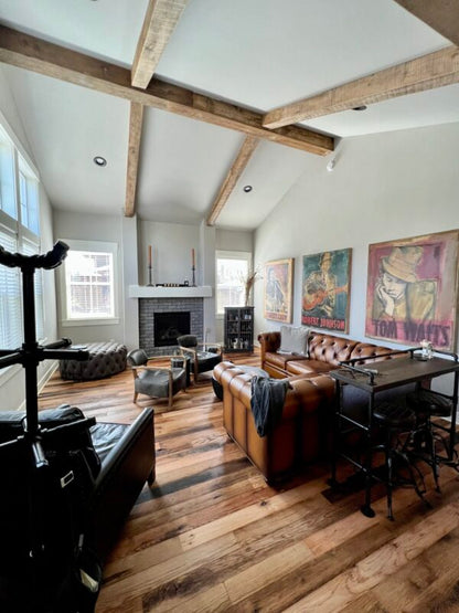 Racehorse Oak Red & White Mix Skip/Wire-Brushed flooring in living area with modern vintage furniture back angle shot