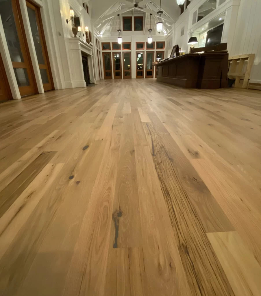 Racehorse Oak Red & White Mix Clean Face wood flooring in business entrance close up 2