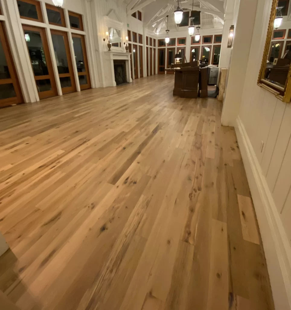 Racehorse Oak Red & White Mix Clean Face wood flooring in business entrance.