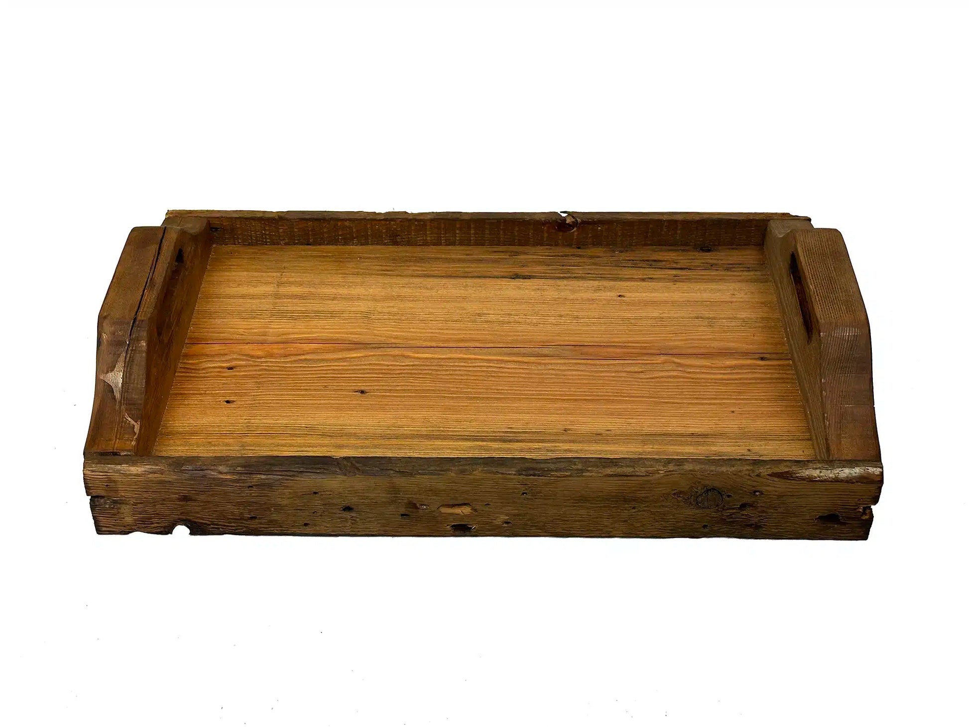 wood serving tray at a wider view showing characteristics displayed in the reclaimed wood used to create the serving tray.