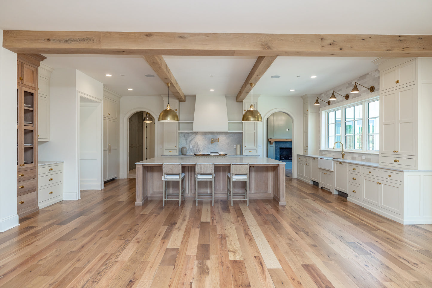 Heartland Barnwood Mixed Hardwoods Clean Face wood flooring in dining area and kitchen.