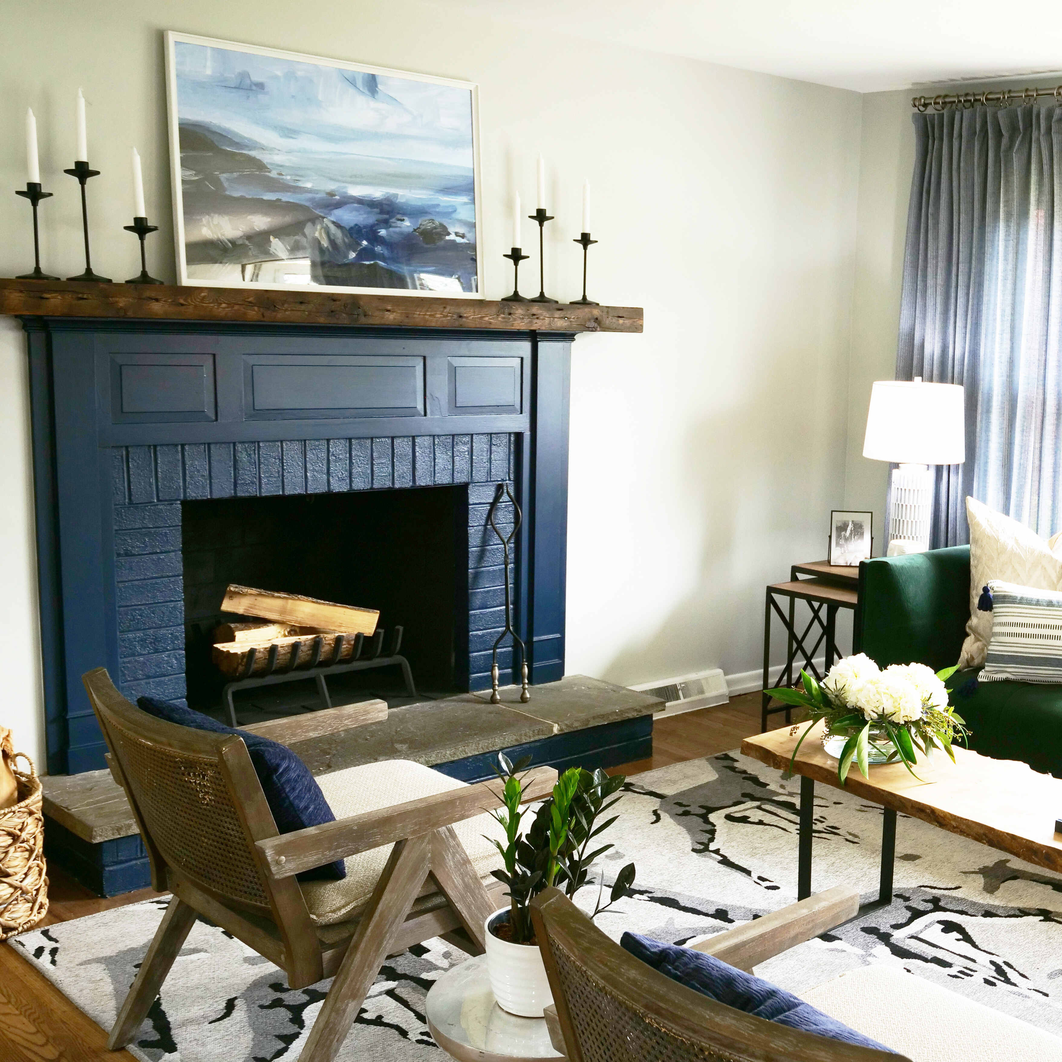 reclaimed wood mantel above fireplace painted blue