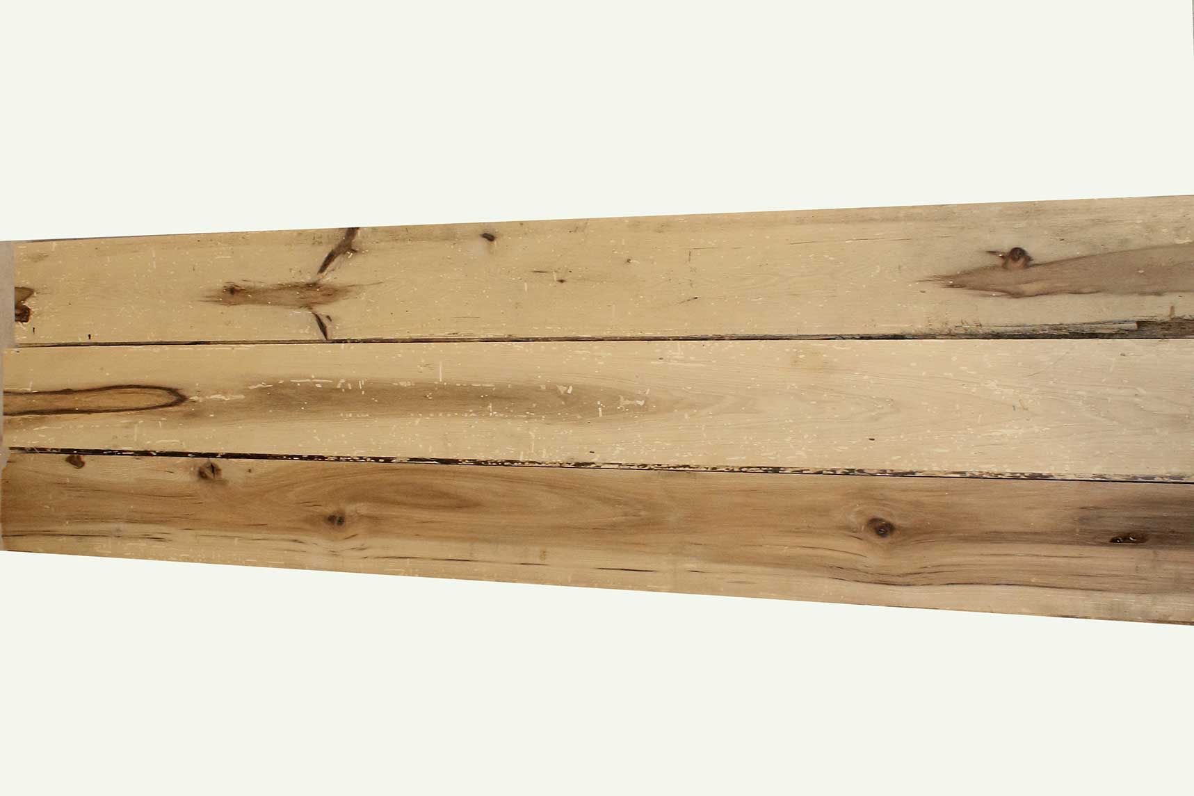 reclaimed hickory flooring. Wood has variations in color and show knots and characteristics from previous bug activity.
