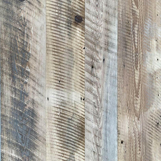 close up of barnwood paneling showing color variations and characteristics.