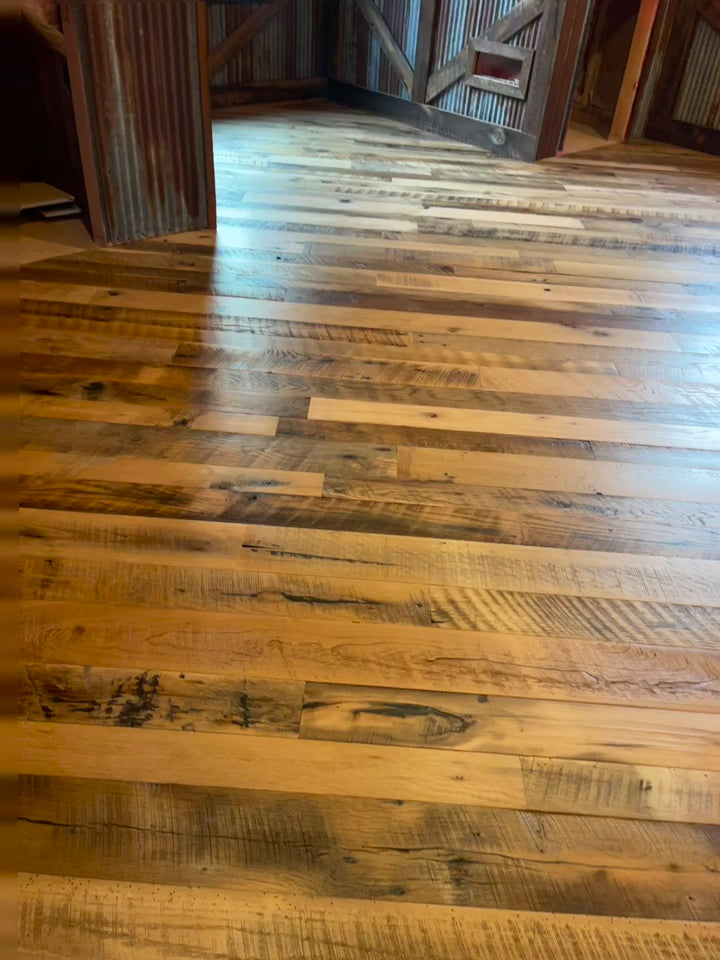 Video of Heartland Barnwood Mixed Hardwoods Skip-Planed Brown flooring and wood wall trim in barn style room 2