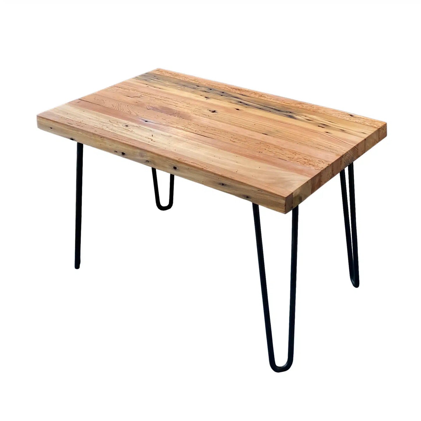 A reclaimed wood coffee table with hair pin legs in a wider view. The view shows variations in the wood and rustic characteristics. The lacquer finish shown adds a slight shine.
