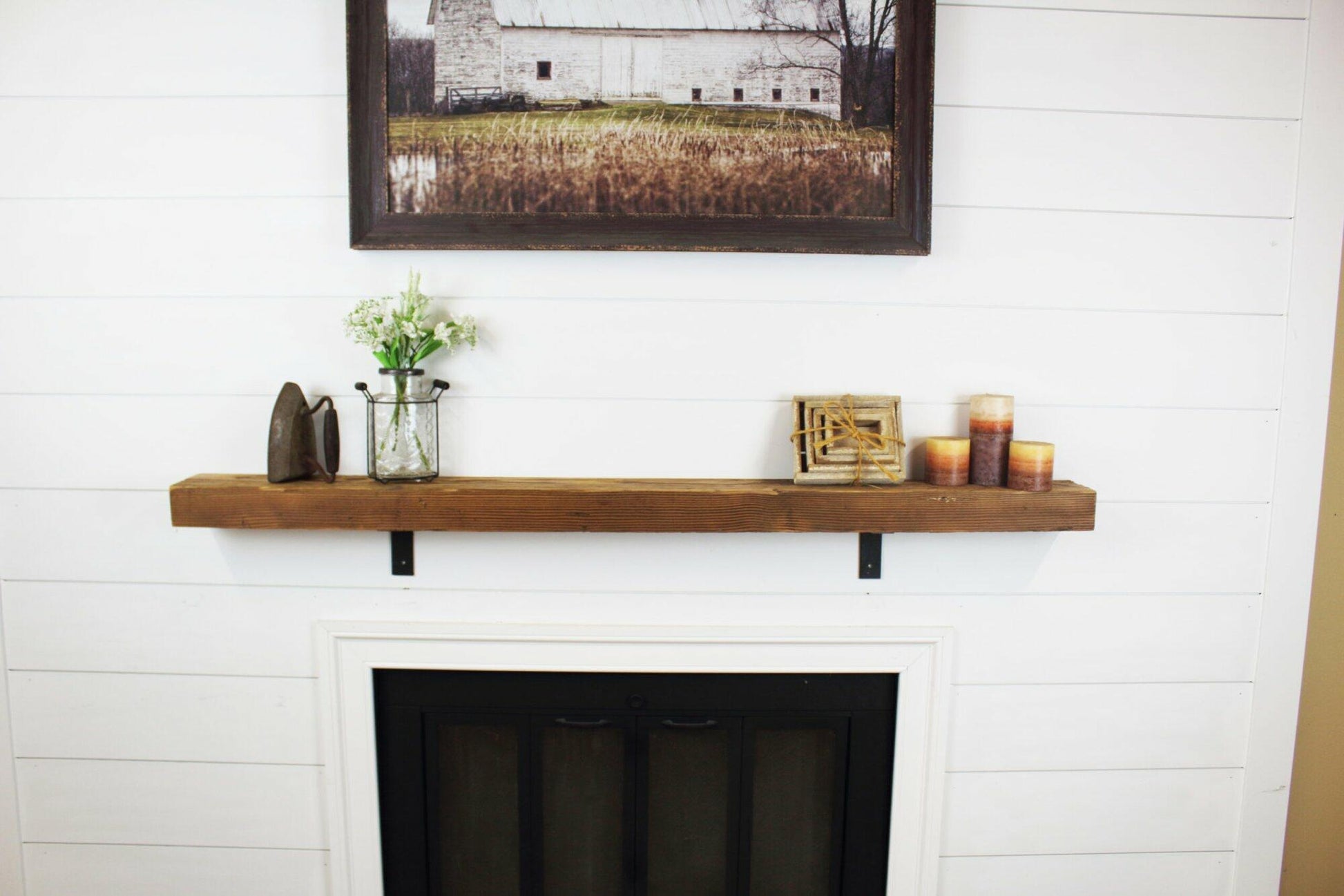 a skip-planed reclaimed barnwood fireplace mantel in the natural finish.